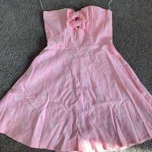 Strapless pink dress and with white lace detailing